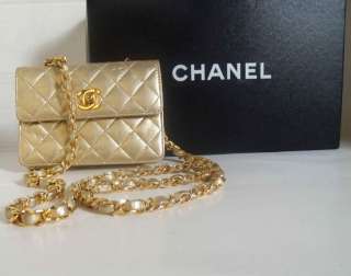 EXQUISITE CHANEL SMALL LAMBSKIN GOLD BAG WITH CC LOGO  