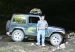 Me next to my Jeep Rubicon. The photo is taken in the mouth of a 