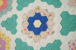 There is quilting around the perimeter of each piece throughout at an 