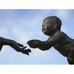  China, Beijing, Statue of Mothers Hand Reach Out of a 