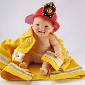 ASHTON DRAKE WRAPPED IN WARMTH LITTLE FIREMAN REALISTIC BABY DOLL by 