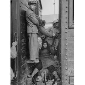 Refugees Riding on Train at Chang Pa Ling Railroad Station 