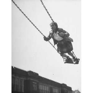 Suzy Creech, Typical Girl Known as a Pigtailer Standing on Swing at 