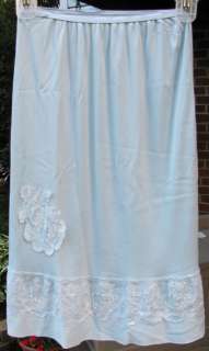 Pretty lace edged scalloped hem. Has an 11 lace edged front walking 