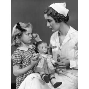  Nurse Consoling Young Girl and Her Doll Photographic 