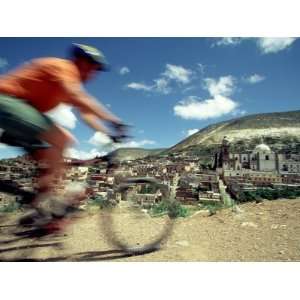  Mountain Biker Riding into Town of Real de Catorce, Mexico 