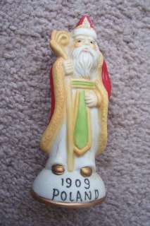 1909 Poland Santa Around the World Figurine  