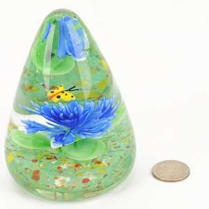   Paperweight Yellow Butterfly Stays on Blue Flower 
