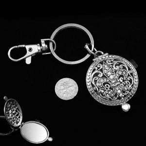 Silver fleur de lis keychain and compact mirror  