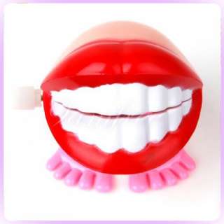 Cute Wind Up Smile mouth Teeth Hopping Toy for children  