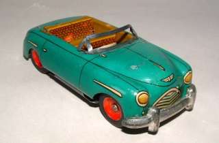 1950s TIN FRICTION CONVERTIBLE TOY CAR MADE IN JAPAN  
