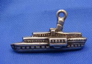 Up for auction is a vintage silver boat ship charm marked 835. The 