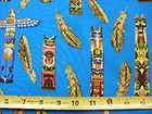 native american collection totem poles blue background cotton fabric 