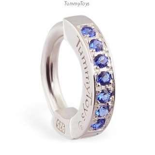 Silver Tummytoys belly sleeper ring with blue CZ gems  