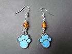 blue enamel animal paw with synthetic amber earrings   tibetan silver