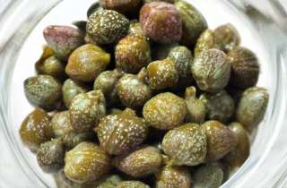 These are the flowering buds of the Mediterranean caper bush, and are 