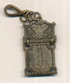 1893 CHICAGO WORLDS FAIR EXPOSITION SOUVENIR WATCH FOB. APROX 2 INCHES 