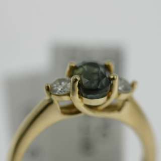 This ring features a 2.03 CTW genuine alexandrite stone set between 