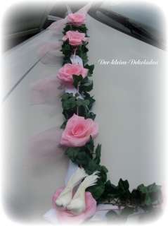 Dekoriert mit 9 Rosen in rosa ,Durchmesser ca 10 cm .