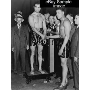  1936 TITLE Louis, Schmeling weigh in for battle. Max Schmeling 