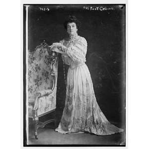  Photo Mrs. Robert Osborn, standing next to chair 1900 
