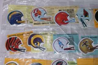 VINTAGE NFL 1980S FOOTBALL HELMET MAGNETS FULL SET OF 28 IN THE 