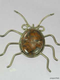   SOUTHWESTERN TRIBAL STERLING SILVER PETRIFIED WOOD SPIDER PENDANT