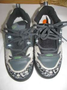   7403 Mint Condition ( NO WHEELS ) tennis shoes only MENS size 7  